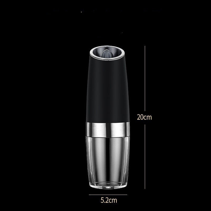 Black and clear bottle with measurements on a black background