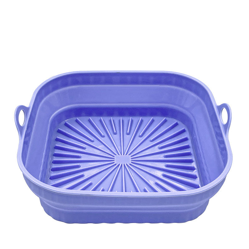 Purple collapsible colander on a white background