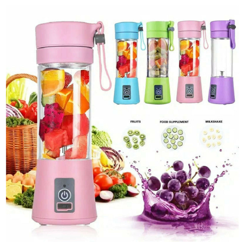 Pink portable blender with fruits, surrounded by vegetables and a basket of fruits on a white background.