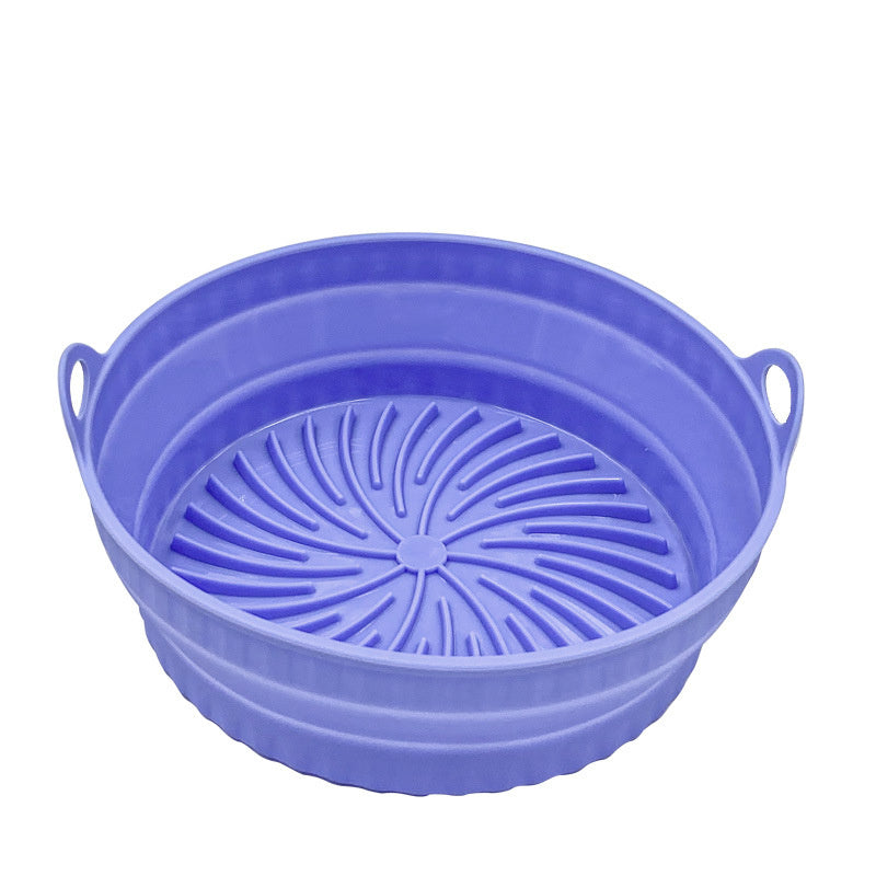 Purple collapsible colander on a white background