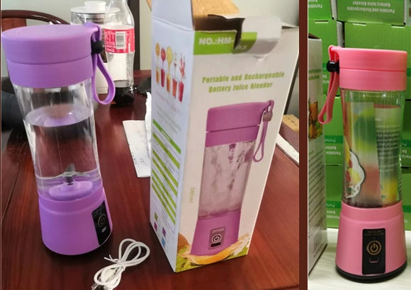 Purple portable juice blender with packaging and a pink one on a table.